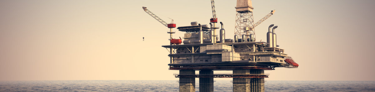 Image of oil platform while cloudless day. Oil platform on sea is offshore structure with facilities to drill wells, extract and process oil and natural gas and temporarily store produced goods until it can be brought to the shore for refining.
